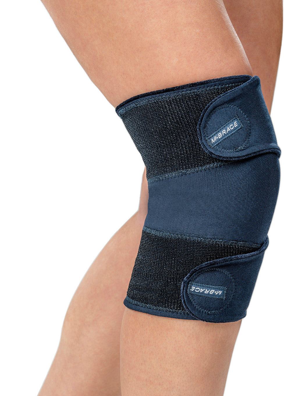 M-Brace Knee Wrap Compression Brace for knee support and injury protection.