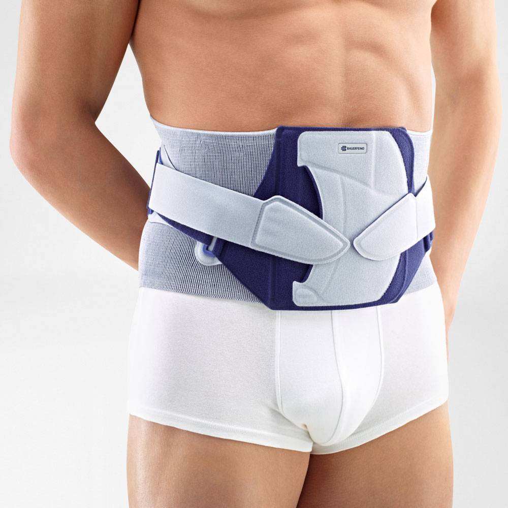 LumboLoc Forte Back Brace supporting lumbar spine with adjustable compression belt.