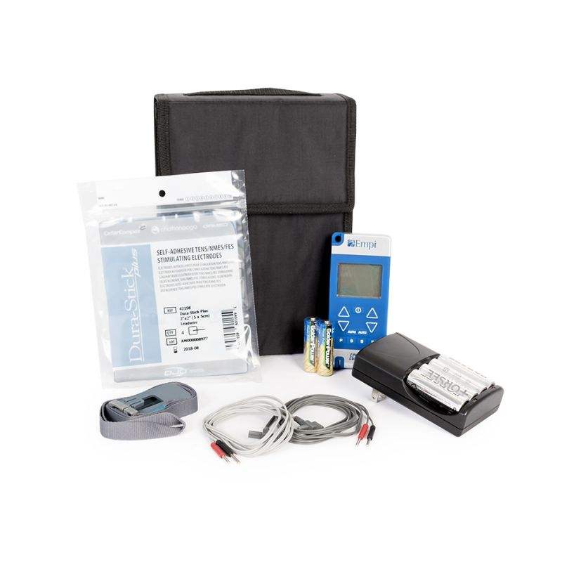 TENS MACHINE ECLIPSE + two-channel TENS machine with accessories including electrodes, lead wires, battery, and carrying case.