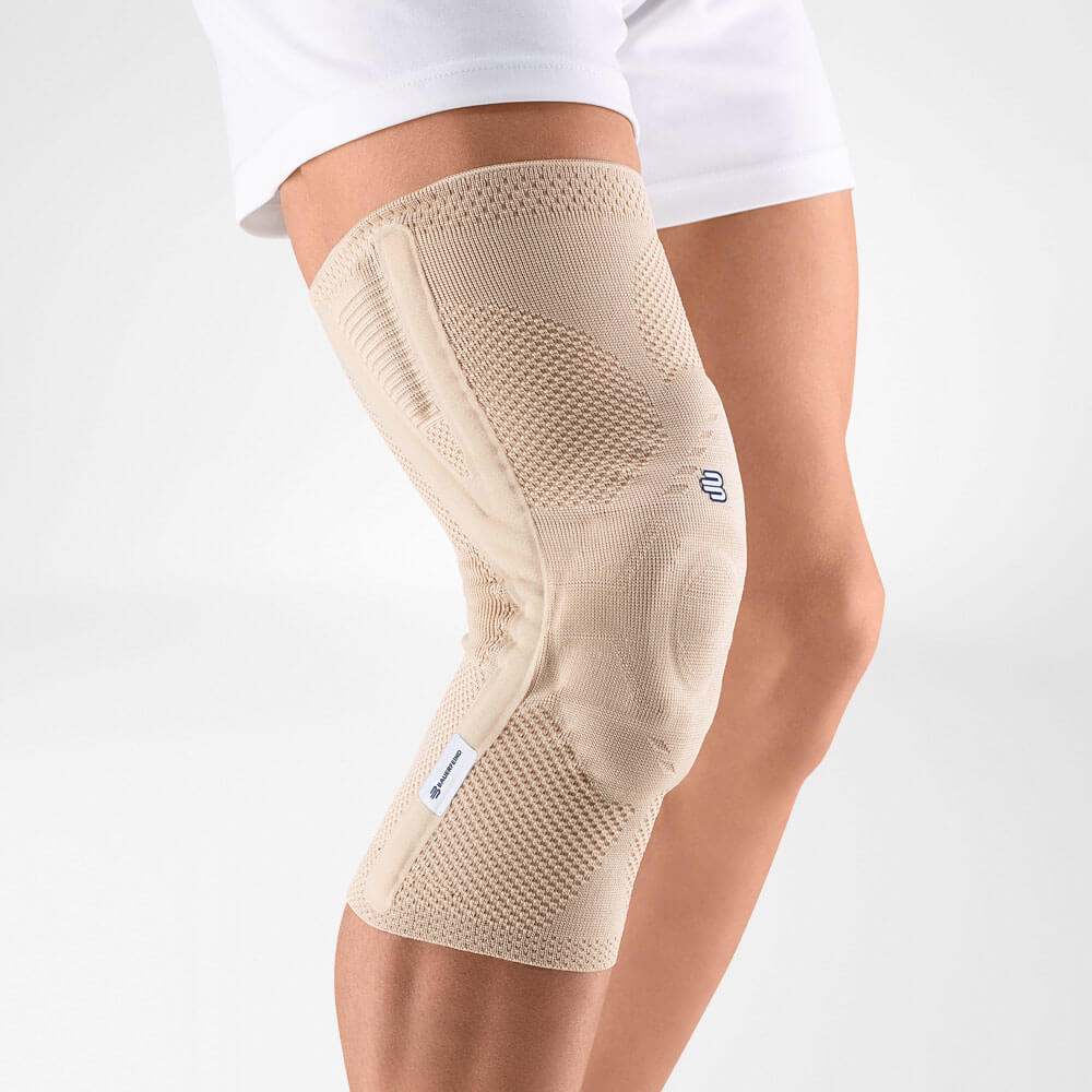 GenuTrain P3 Knee Brace with silicone band on knee for pain relief and patella support.