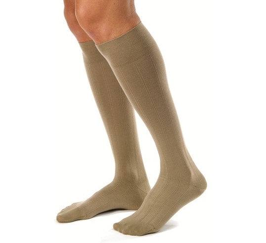 JOBST forMen Casual knee-high compression socks in beige, providing all-day comfort and moisture-wicking.