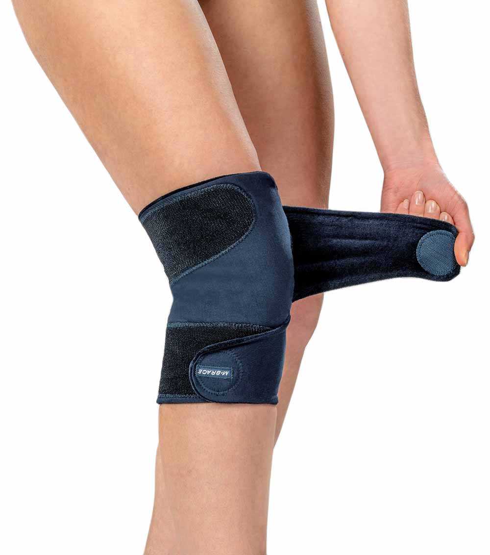 M-Brace Knee Wrap Compression Brace providing adjustable support for knee injuries.