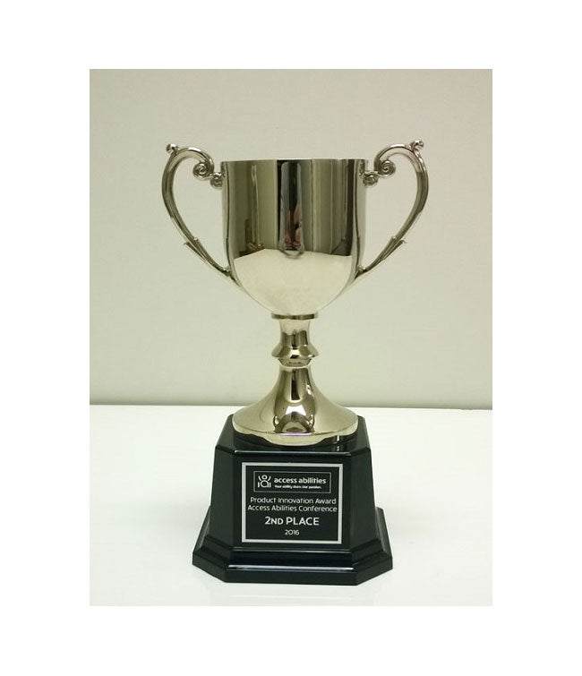 Award-winning Ultimate Toilet Safety Frame with adjustable arms, integrated toilet paper holder, and universal fit for all standard toilets.