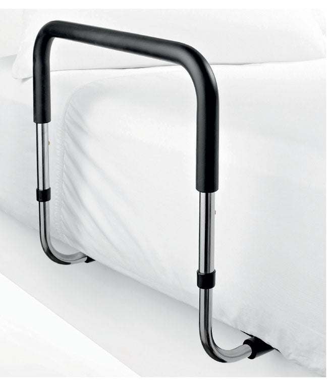 Bed assist rail with foam rubber grip, adjustable height, and safety straps on a bed.