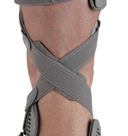 Unloader One® Custom OA Brace on leg, showing dual Dynamic Force System™ straps for knee pain relief.