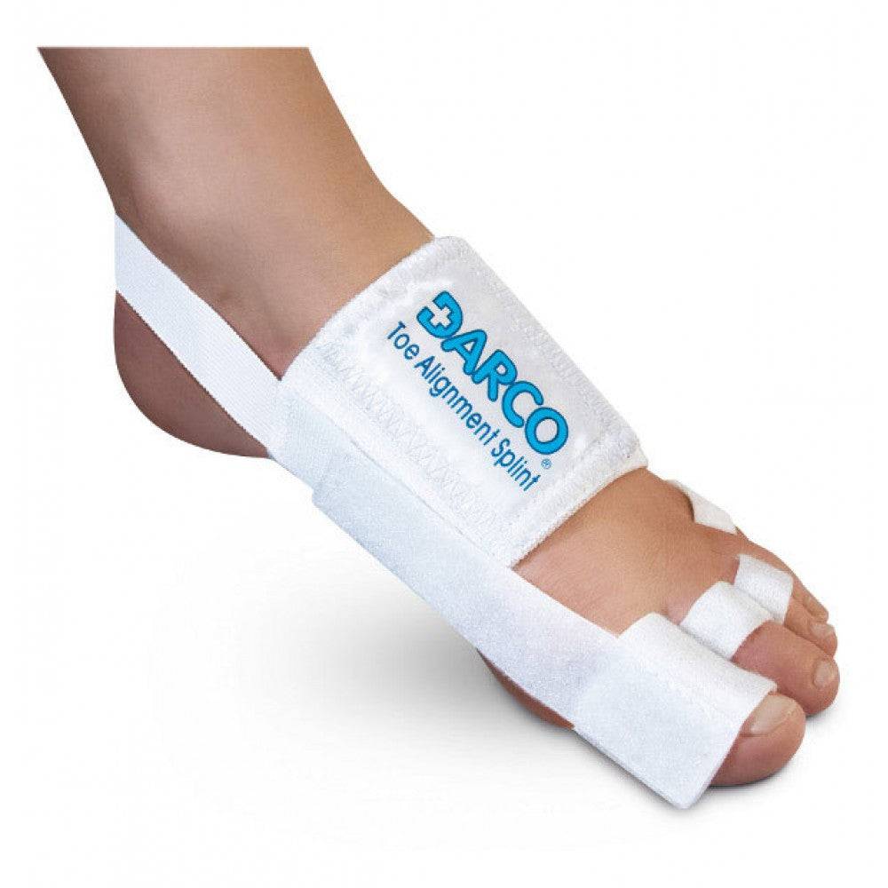 Toe Alignment Splint on a foot for post-operation positioning, featuring a low profile metatarsal band and special T-strap.