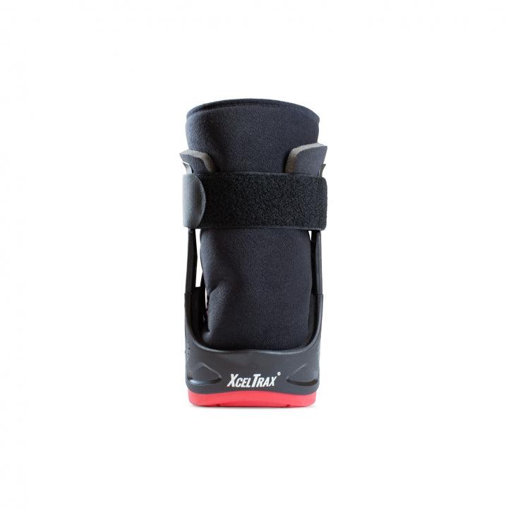 Low Walking Boot with air by XCELTRAX® AIR ANKLE, designed for support and comfort post-injury, featuring cushioned soles and pneumatic liner.