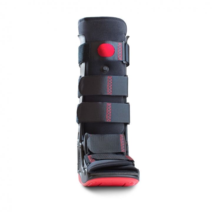 High walking boot for post-operative support and comfort with adjustable strapping and shock-absorbing sole.
