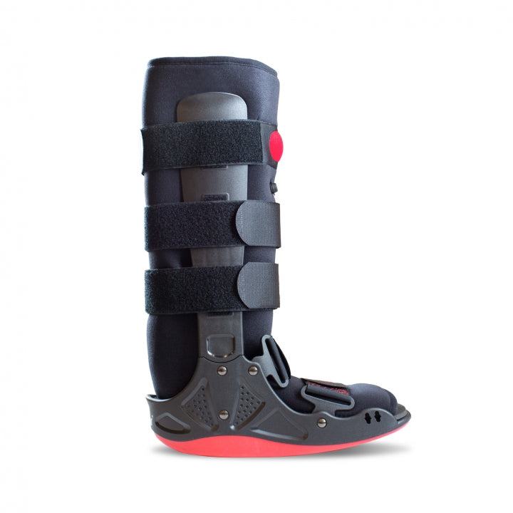 High walking boot with air pump, cushioned soles, and adjustable strapping for support and comfort.