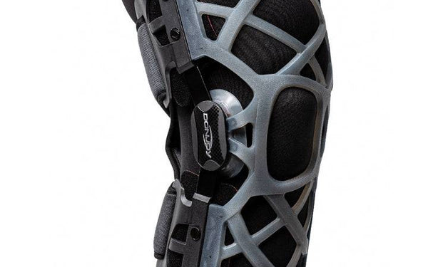 Hinged unloader knee brace used to support knee osteoarthritis