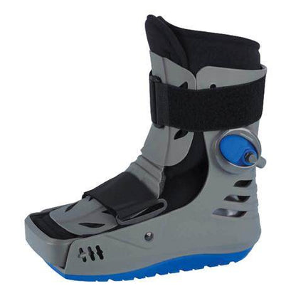 low walking boot with pneumatic rigid-shell and rocker sole for comfort and stability