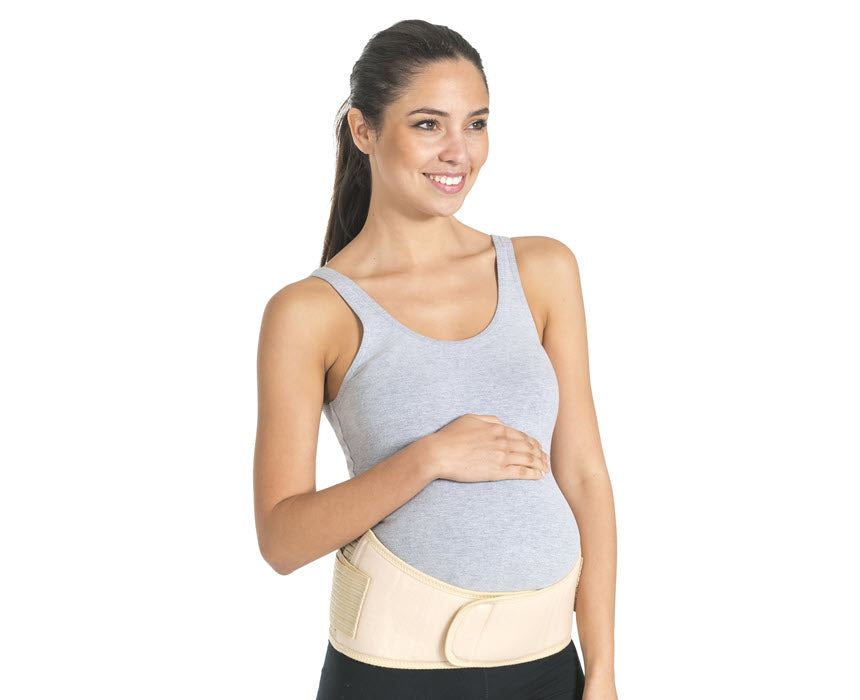 Pregnant woman wearing ORTHOLIFE Deluxe Maternity Back Brace for lumbar support.