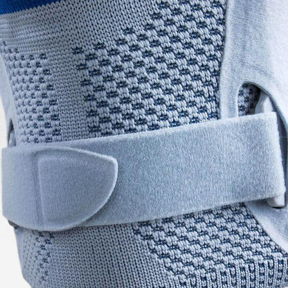 Bauerfeind GenuTrain S Knee Brace with adjustable strap and breathable knit fabric for stability.