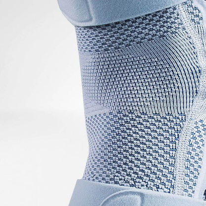 Bauerfeind GenuTrain S knee brace with breathable knit and adjustable support.