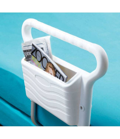 Ez Grip Bed Rail with storage pocket attached to bed, non-metal handles.
